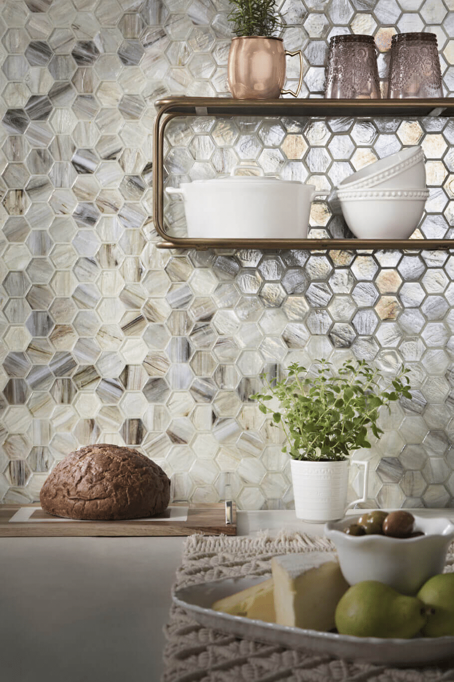 Kitchen backsplash with variegated, iridescent hexagon mosaic tile